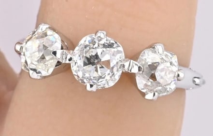 Edwardian 18K White Gold 3-Stone Diamond Ring 1.87 Carats Old Mine Cuts
