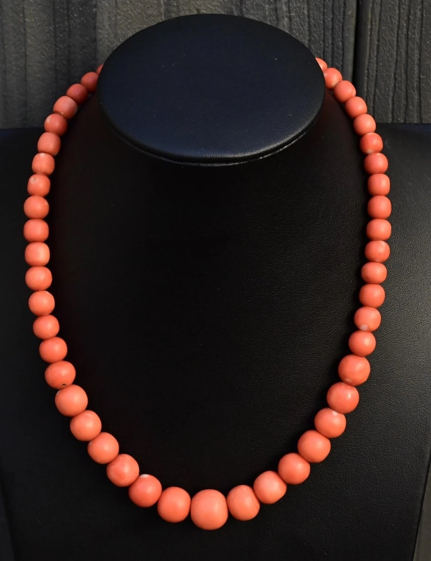 Japanese Momo Coral Bead Necklace with 14K Gold Clasp – 17.5”, 51.15g: This stunning Japanese Momo coral necklace features beautifully matched natural coral beads in rich, warm peachy-orange tones, gradually graduating in size for a classic, balanced look. Measuring 17 1