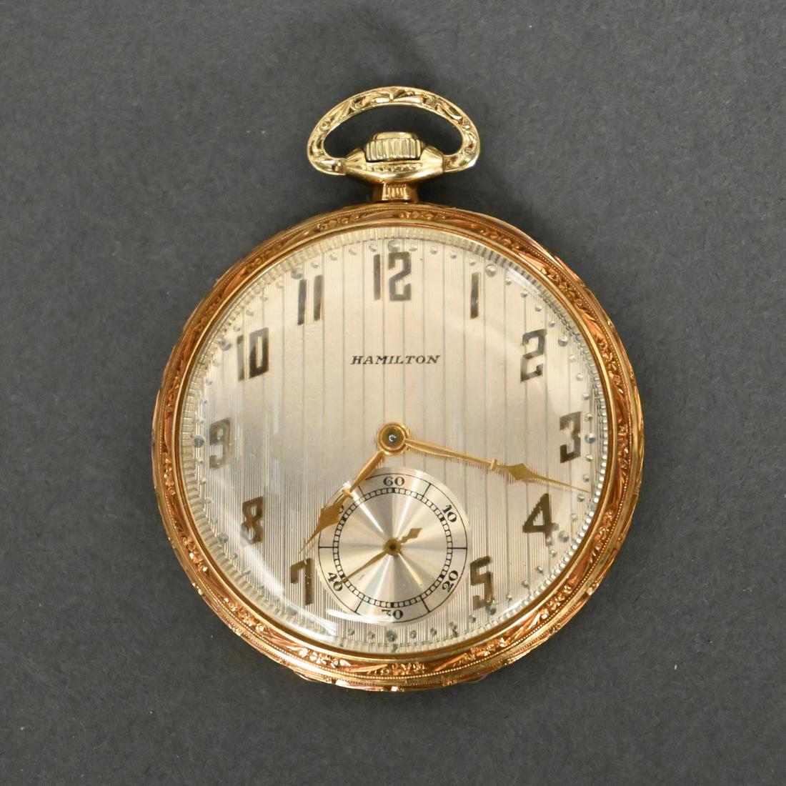 American 14k Gold Pocketwatch By Hamilton: American 18k Gold Open Face Pocketwatch By Hamilton, The 23 Jewel Masterpiece Movement Numbered #3012192, The Case Numbered #3008089 With Original Box. Diameter 1 3/4 Inches.