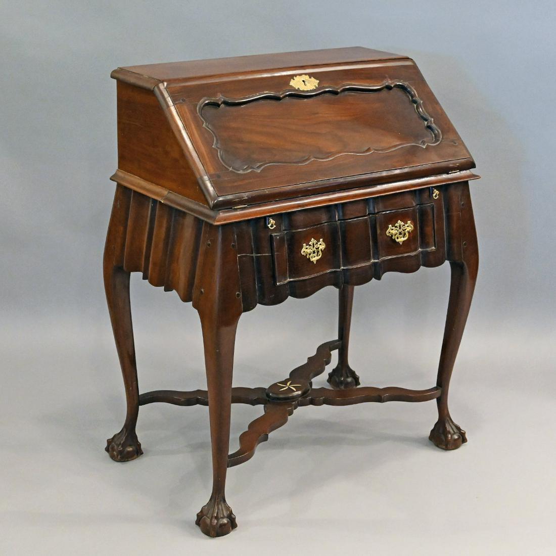 South African Chippendale Style Stinkwood Desk: South African Chippendale Style Stinkwood Fall Front Writing Desk, Raised On Claw Feet. The Oblong Hinged Lid Opening To A Fitted Interior, Above A Scalloped Apron With Conforming Drawer, Raised On Ba