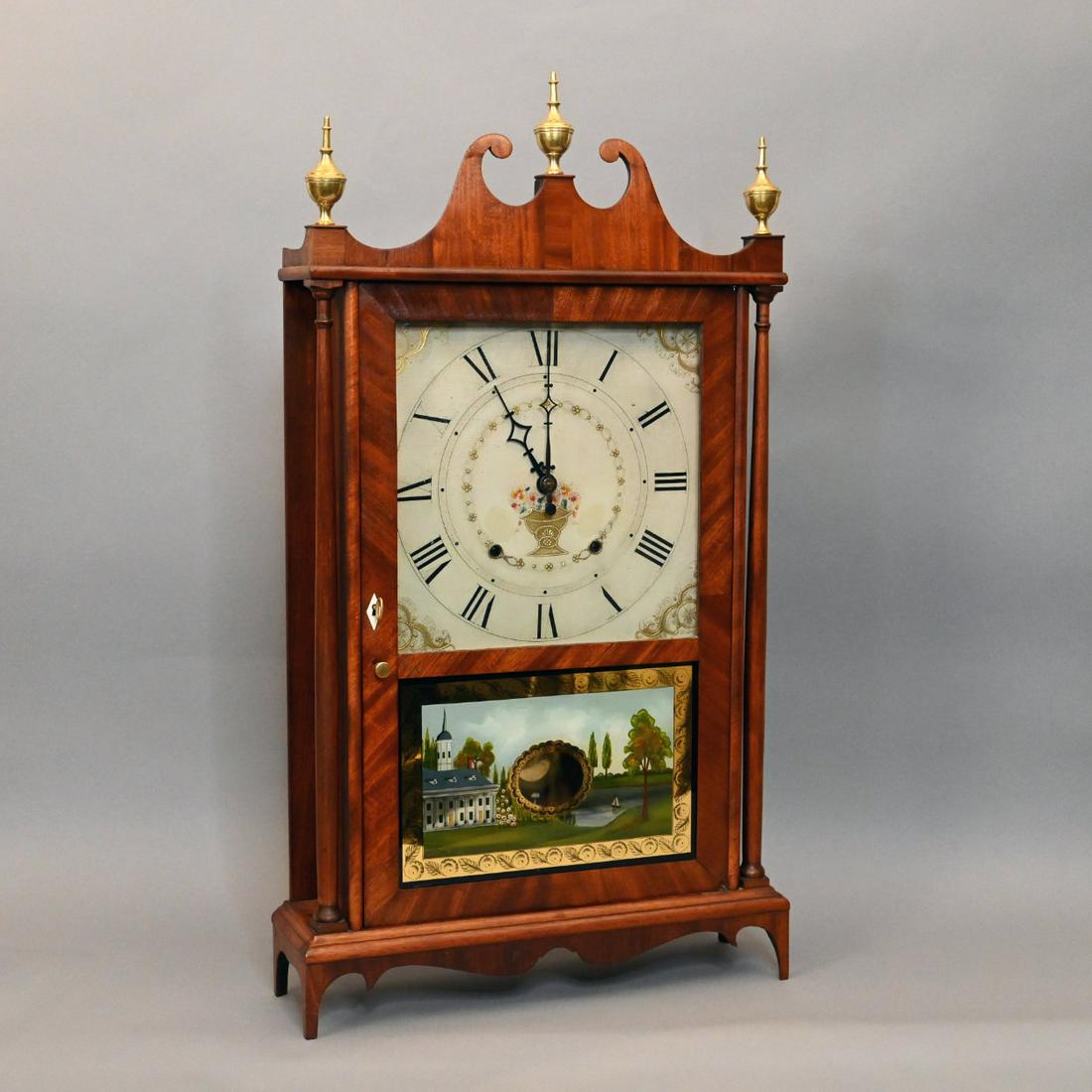Connecticut Federal Mahogany Pillar & Scroll Clock: Federal Mahogany Pillar And Scroll Clock, Seth Thomas, Plymouth, Connecticut. The Broken Arch Pediment With Brass Finials Above A Rectangular Door With Reverse Painted Panel, Flanked By Tapering Colum