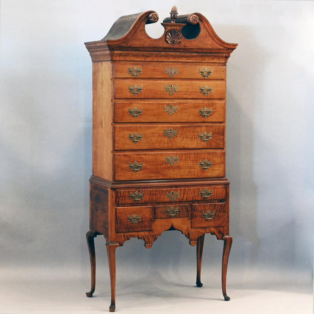 American Queen Anne Tiger Maple Highboy: American Queen Anne Tiger Maple Highboy. In Two Parts: The Upper Section With Broken Arch Pediment Centering A Shell Carved Plinth With Finial Above A Blind Long Drawer Over Five Long Drawers; The Low