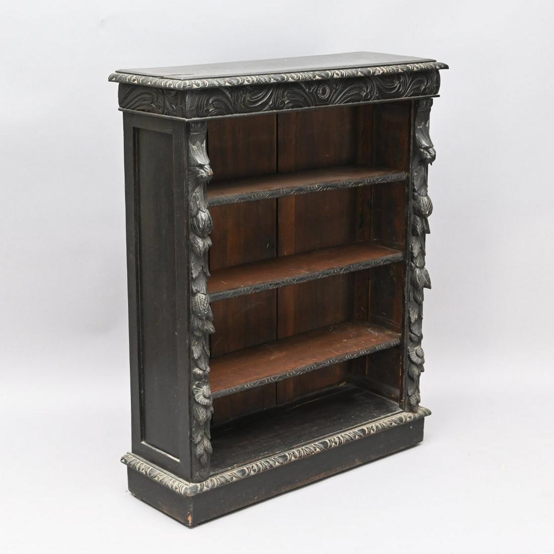 Renaissance Style Carved Oak Bookcase: Late 19th Century Continental Renaissance Style Carved And Ebonized Oak Open Bookcase. Height 44 1/2; Width 35 1/2; Depth 12 Inches.