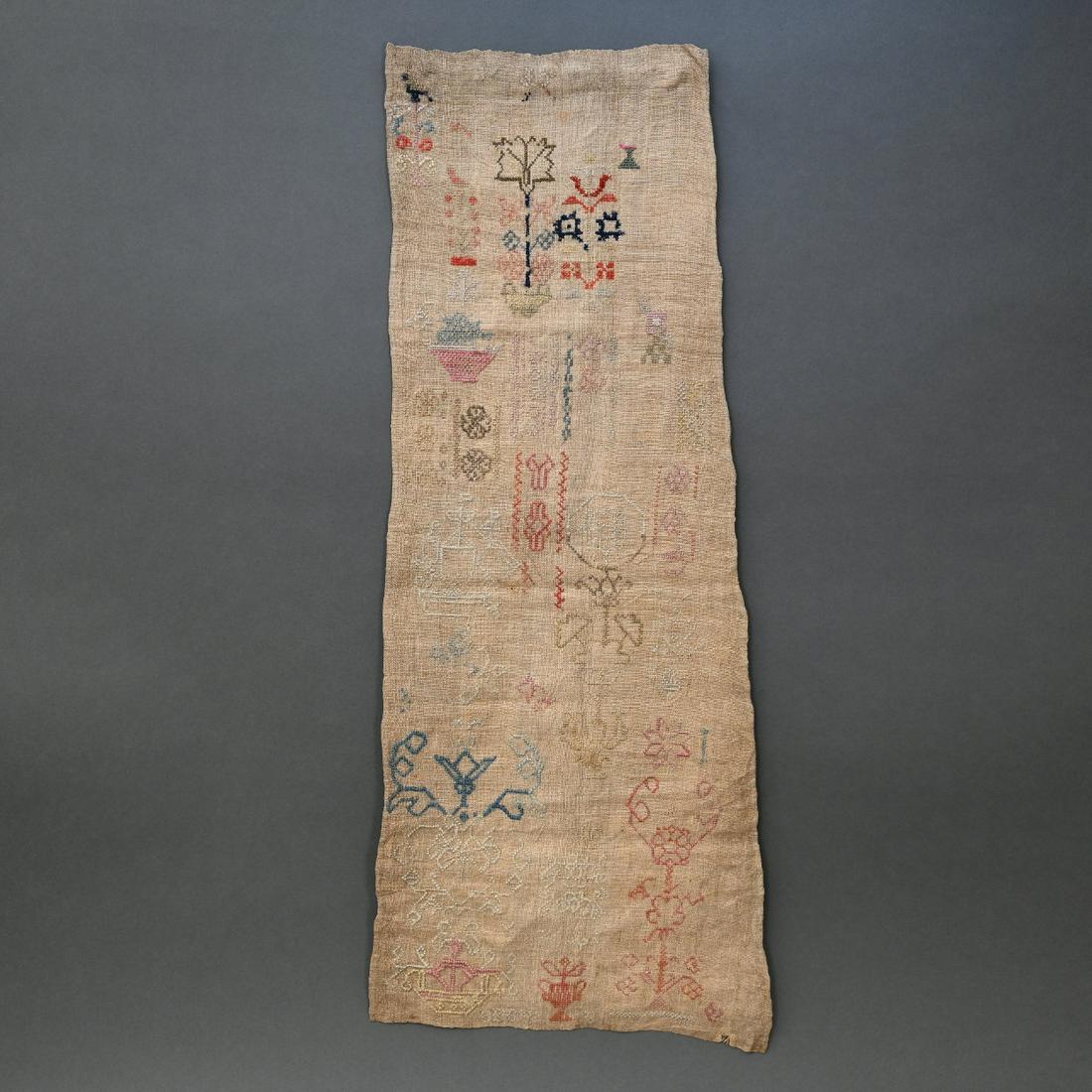 Needlework Sampler: Needlework Sampler, With Depictions Of Flowers, Sailing Ships, Unmounted (26 1/2 X 11 1/2 Inches At Widest Point)