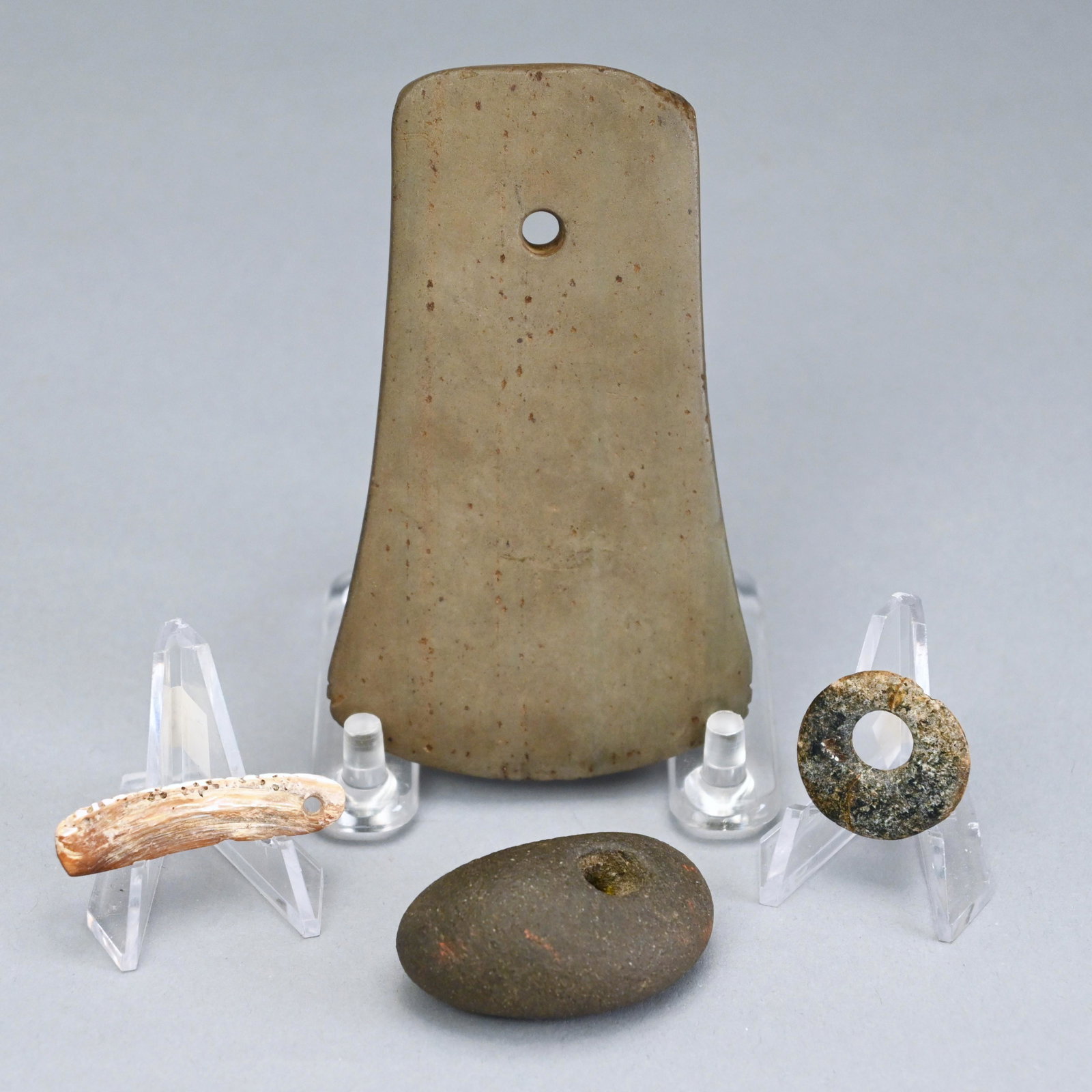 Three Stone Pendants & A Mother of Pearl Pendant: Provenance: The Collection of Stanley H. Rae & Ruth A. Rae. H: 3.875 in., W: 2.25 in., D: 0.25 in. (largest)