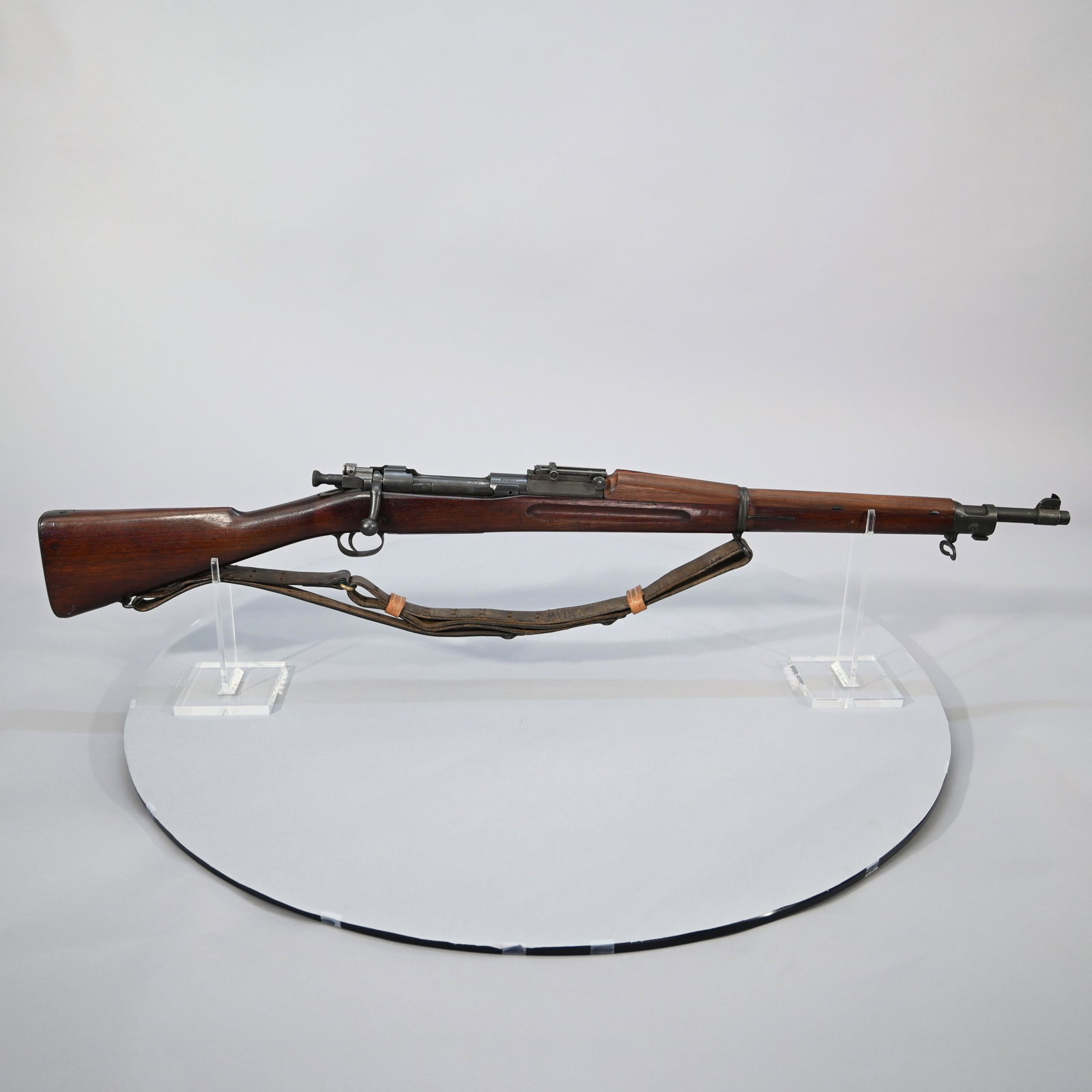 US Springfield Model 1903 Bolt-Action Rifle: Caliber: .30-06, #32609 (1904), with leather sling. Later barrel marked "USMC" over "10-43" over circled "S". Barrel length: 23.5 inches. Overall length: 43.5 inches.
