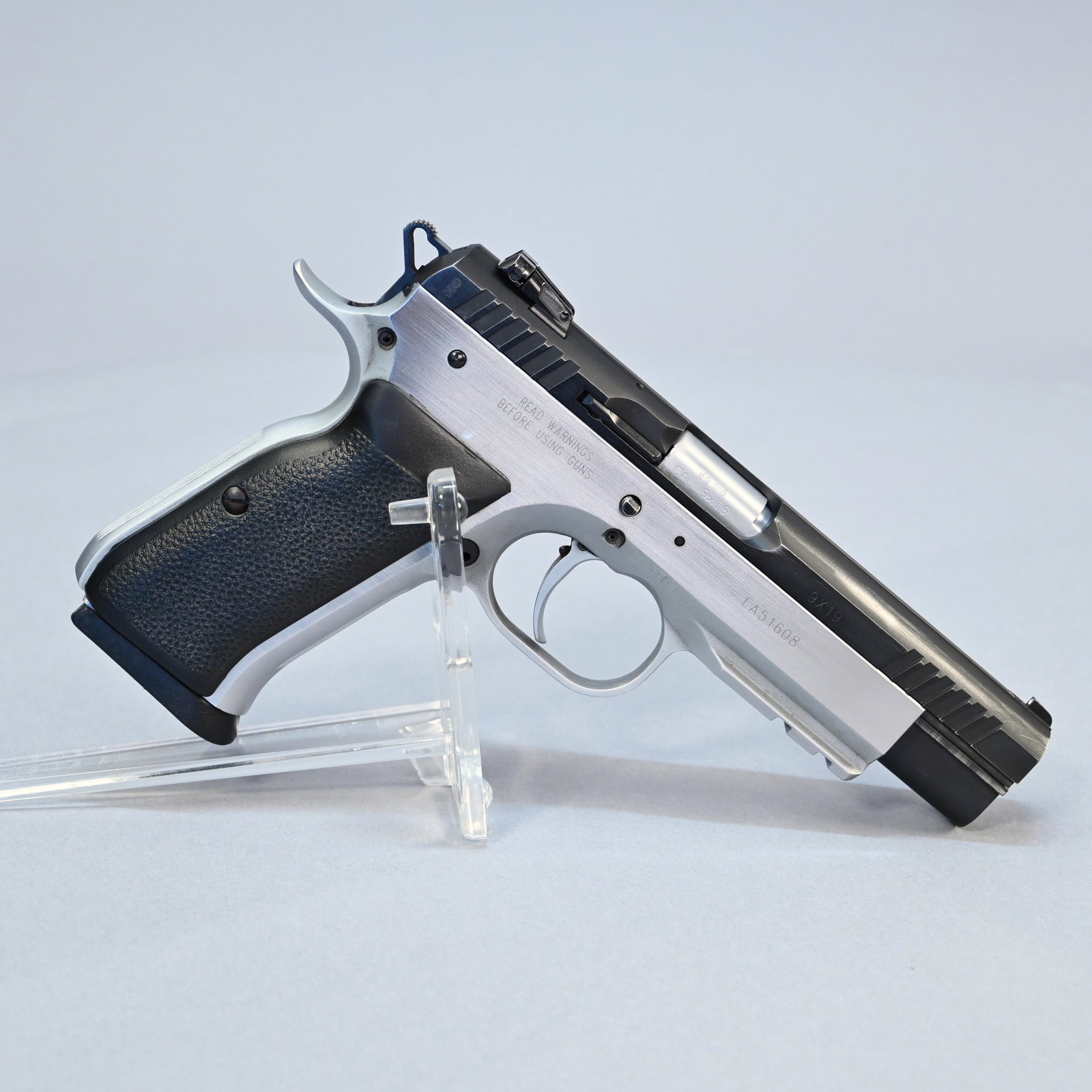 EAA Tanfoglio Model Witness Match: Single-action semiautomatic pistol chambered in 9mm Luger, #EA51608; black plastic grips; 17-round magazine; with original hardshell case. Barrel length: 4.75 inches. Overall length: 8.75 inches.