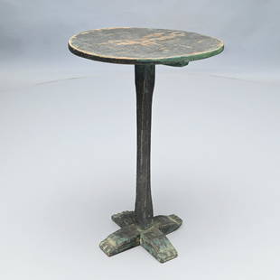 American Painted Oak Shoe-Foot Candlestand: The circular top above a batten and square standard with chamfered corners, raised on X-form shoe feet. H: 27 in.; W: 18.5 in.; D: 17.5 in.