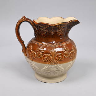 Rare D & J Henderson Stoneware Pitcher, 1828-33: Rare David & John Henderson Glazed Stoneware Pitcher, Jersey City, New Jersey, 1828-33. Molded around the sides with double acanthus scrolls issuing scrolled tendrils centering leaftips, the base of t