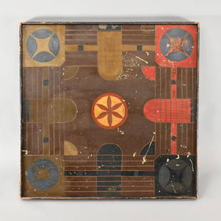 American Painted Wood Parcheesi Board: Painted in shades of red, green, mustard, brown and black with hex signs, arched panels and grids, the reverse painted in brick red, black and orange with a checkerboard playing surface. H: 18.875