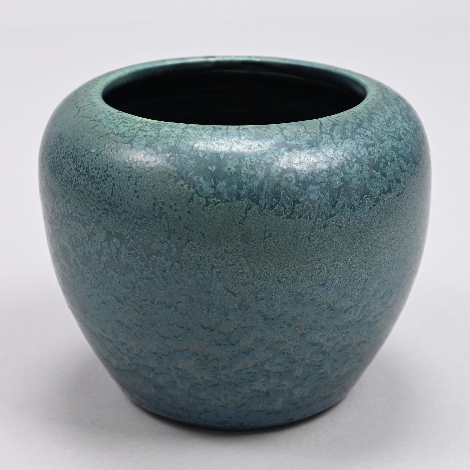 Hampshire Pottery Vase, Cadmon Robertson, 1904-14: Designed by Cadmon Robertson, Keene, New Hampshire, 1904-14. Of tapered cylindrical form, covered in matte blue curdled glaze, incised "Hampshire Pottery," letters "M" and "O" (M within a circle) for