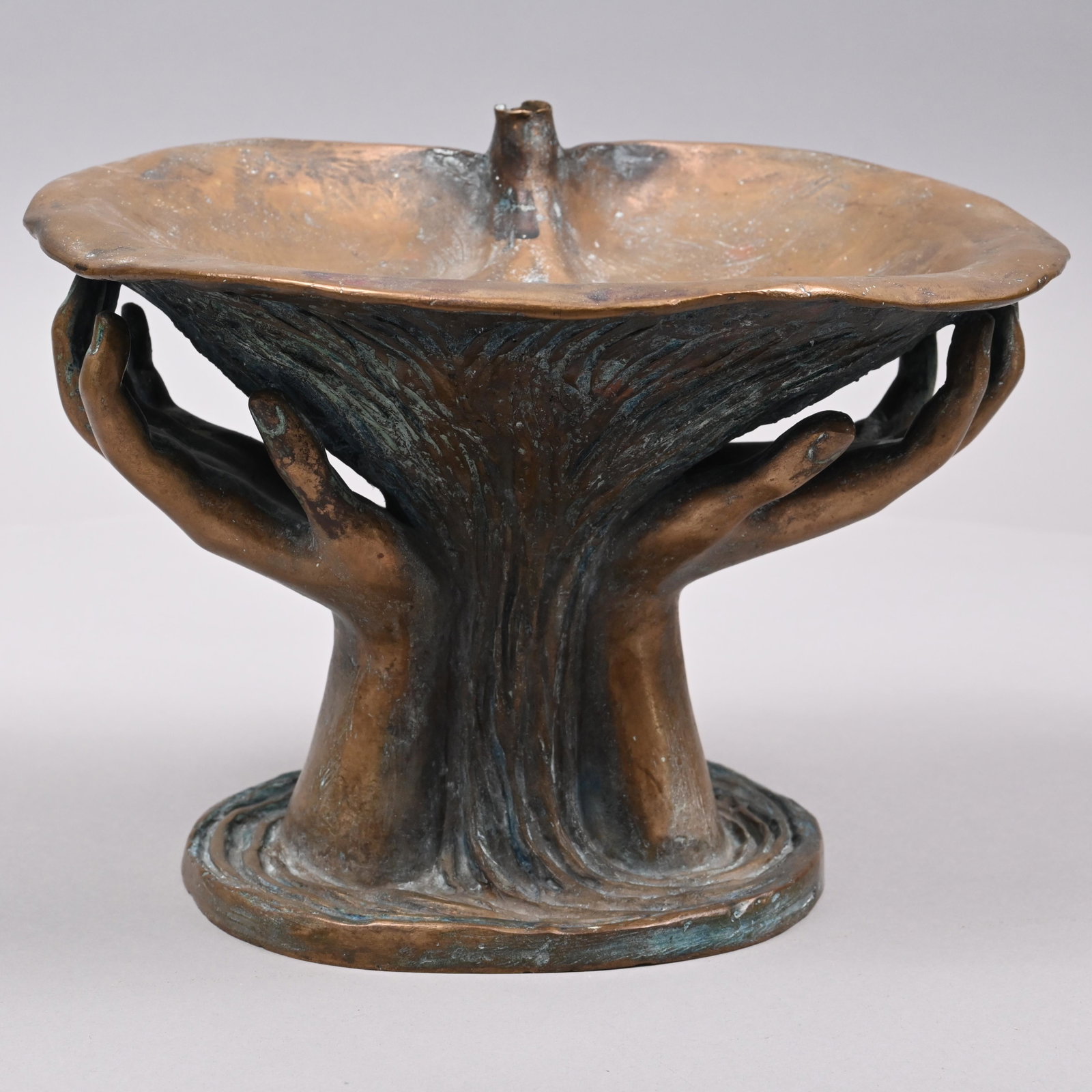 Art Nouveau Bronze Fountain, Roman Bronze Works,NY: Art Nouveau Garden Fountain, Roman Bronze Works, Corona, New York, Early Twentieth Century. Cast as a pair of hands rising from a swirl of water and supporting a lily pad, cast "ROMAN BRONZE WORKS N.Y