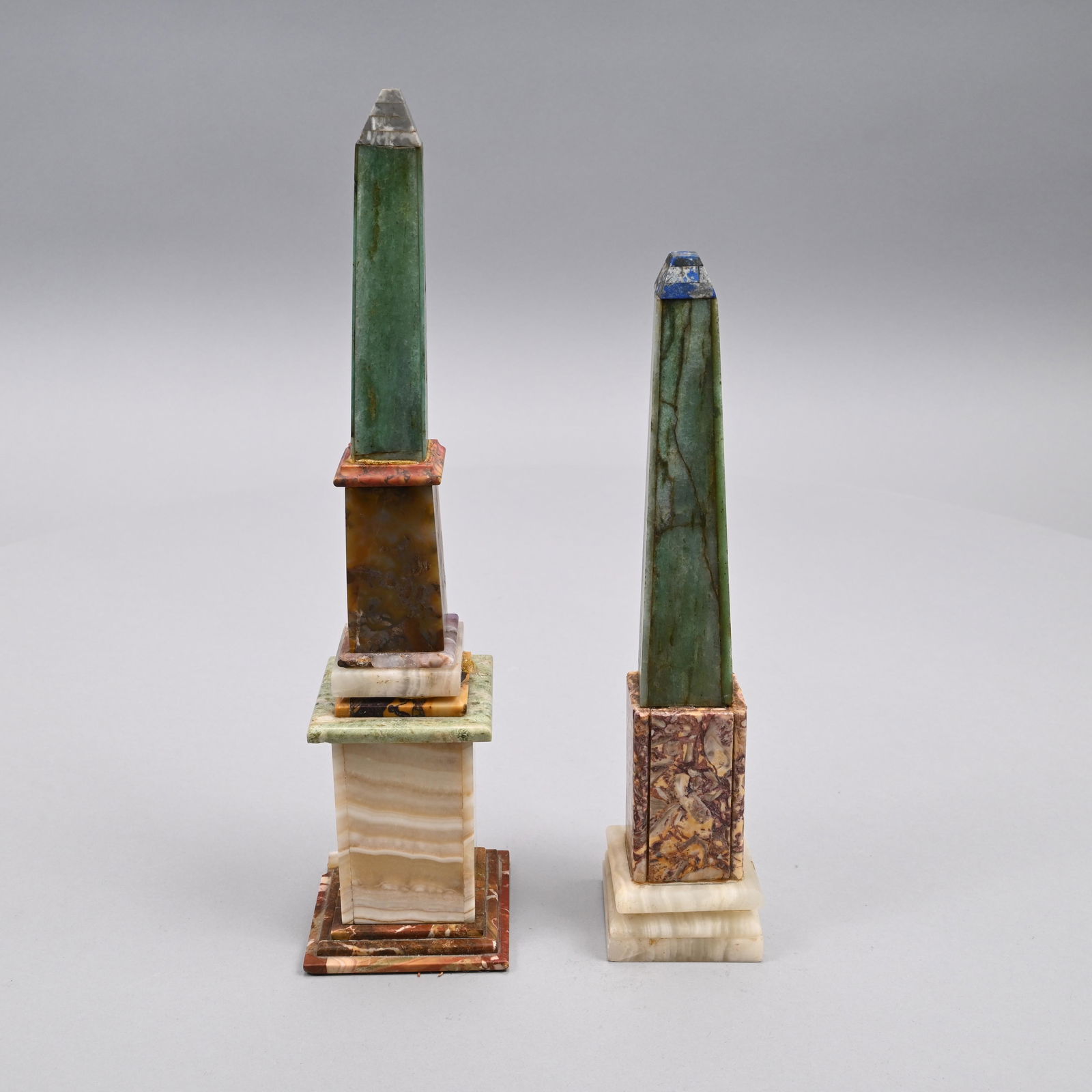 Two Continental Specimen Marble Obelisks: Grand Tour or later. The shortest inscribed indistinctly beneath the base. Shortest: H: 10.25 in., W: 2.25 in., D: 2.25 in. Tallest: H: 12.25 in., W: 3 in., D: 3 in.