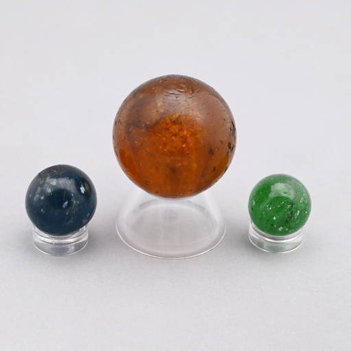 Three Mica Marbles In Green, Blue And Amber