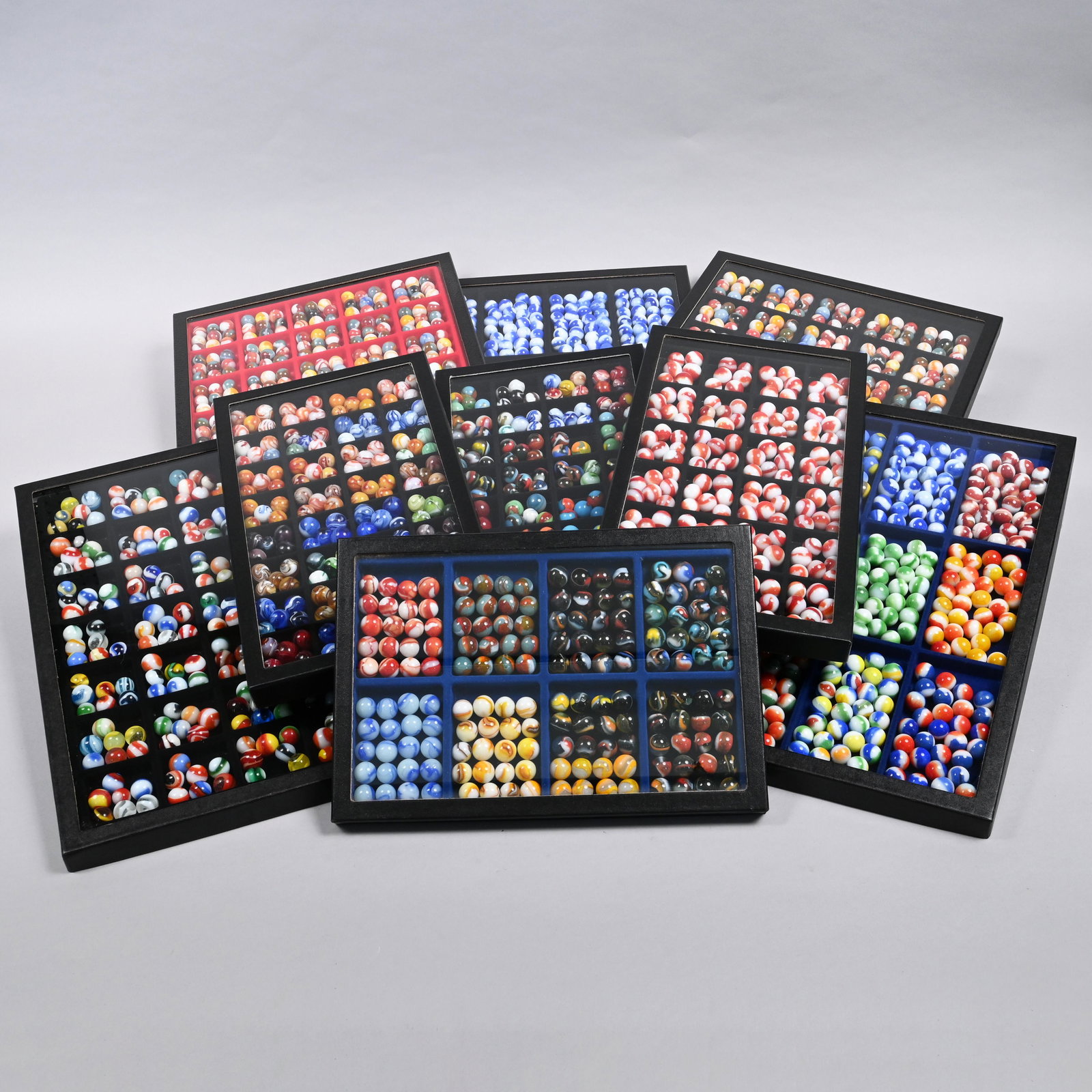 Nine Trays of Vintage Machine-Made Marbles: Tray: H: 12.25 in., W: 16.25 in., D: 1 in.