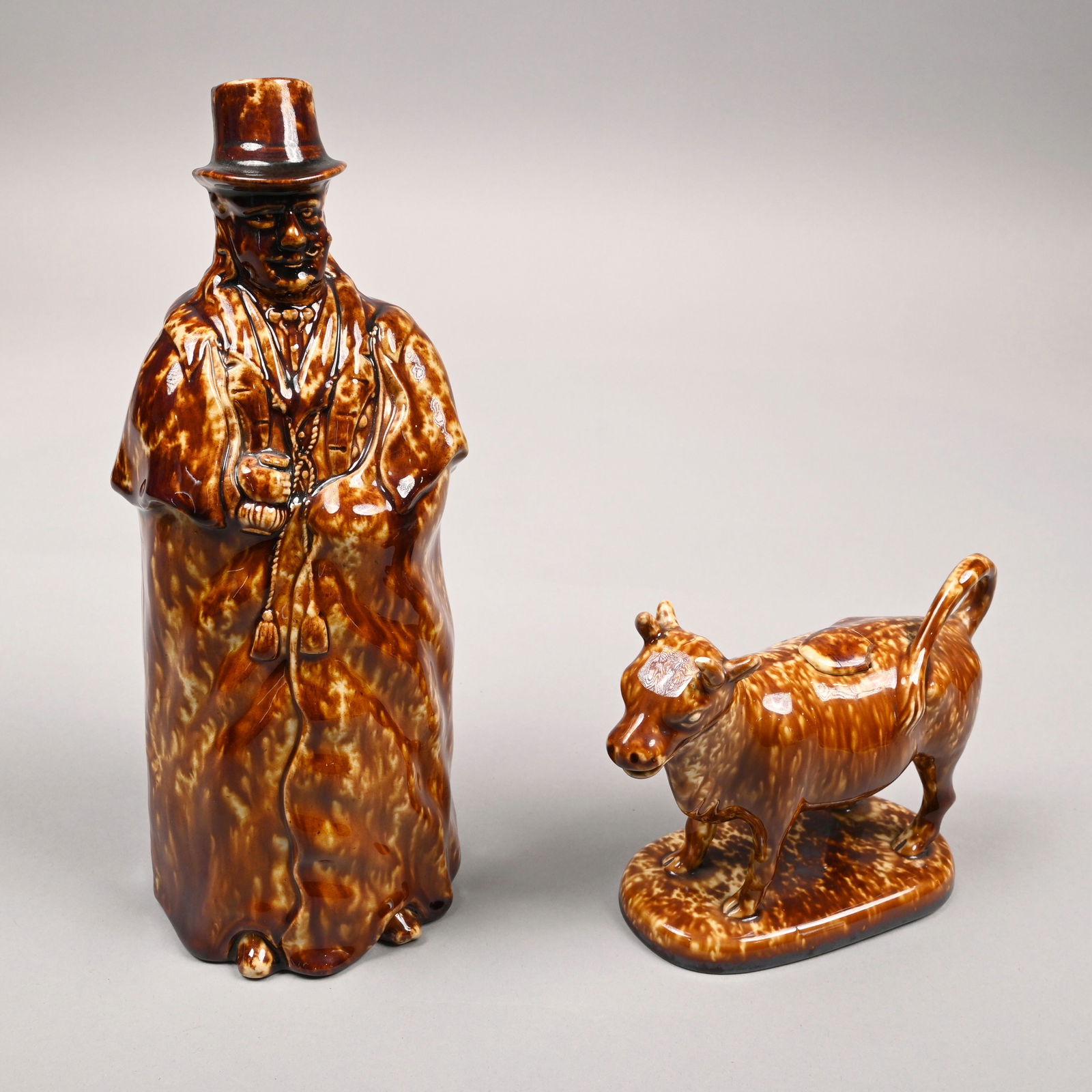 Bennington Rockingham Glazed Coachman Bottle & Cow