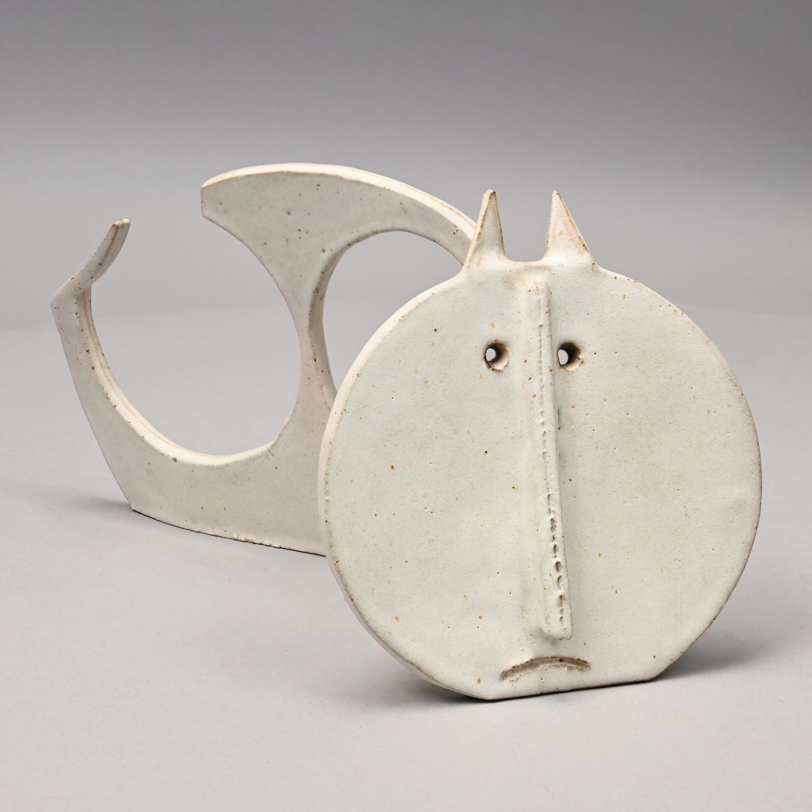 Bruno Gambone - Glazed Stoneware "Cat" Sculpture: Bruno Gambone (Italian, 1936-2021). From the "Animali Fantastici" Series: Stoneware Figure of a "Cat" and "Dog," Early 1970's-1990's. Modelled, incised and covered in speckled matte cream glaze, compo