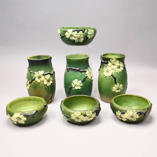 Seven Roseville Pottery 'Dogwood II' Vases & Bowls: Seven Roseville Pottery Company 'Dogwood II' Vases and Bowls, Zanesville, Ohio, Introduced in 1928. Comprising a pair of vases and a slightly larger vase, three bowls, and a large bowl, one vase of th