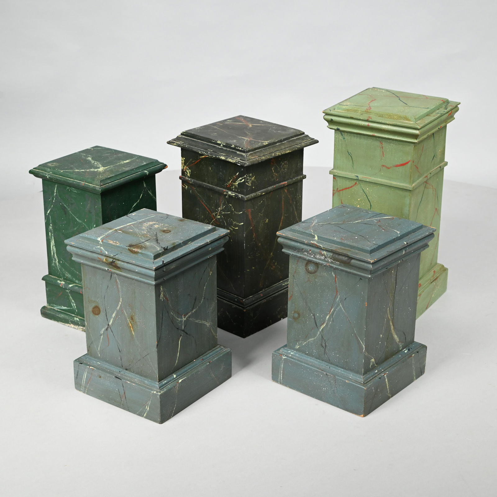 Five Marbleized Pine Pedestals Auction