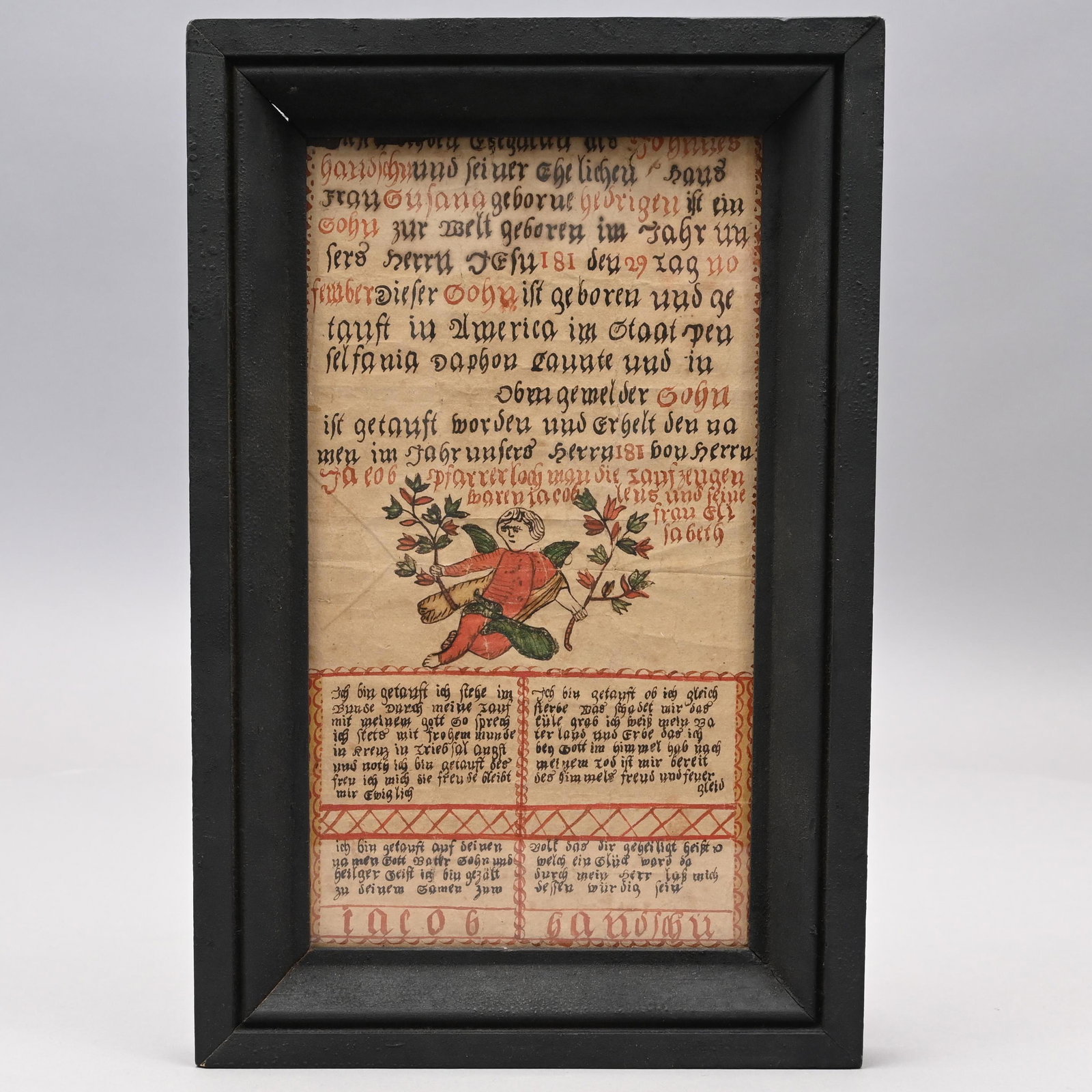 Pennsylvania German Birth and Baptismal Fraktur: Pennsylvania German Birth and Baptismal Fraktur. For Jacob Bandschu, "Born November 29, 181(?), in America in the state of Pennsylvania." Colored pencil on paper, centered by an angel bearing leafy br