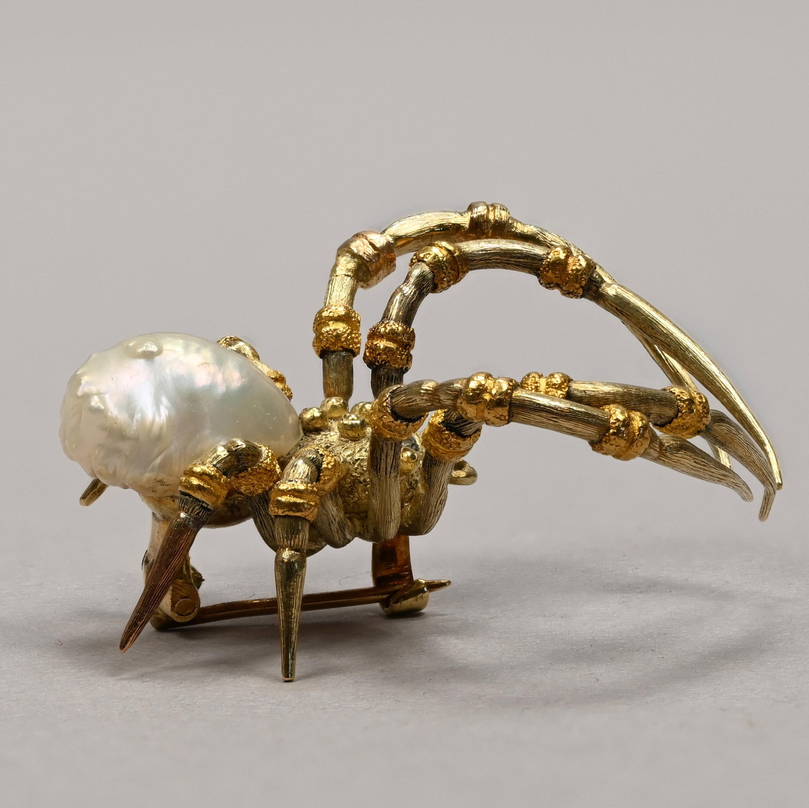Tiffany & Co. 14K Gold, Pearl & Diamond Spider: Tiffany & Co. 14K Yellow Gold, Pearl and Diamond-Set Spider, Possibly after a Design by George Paulding Farnham (1859-1927). The spider with large pearl body and curved textured legs banded in gold, s