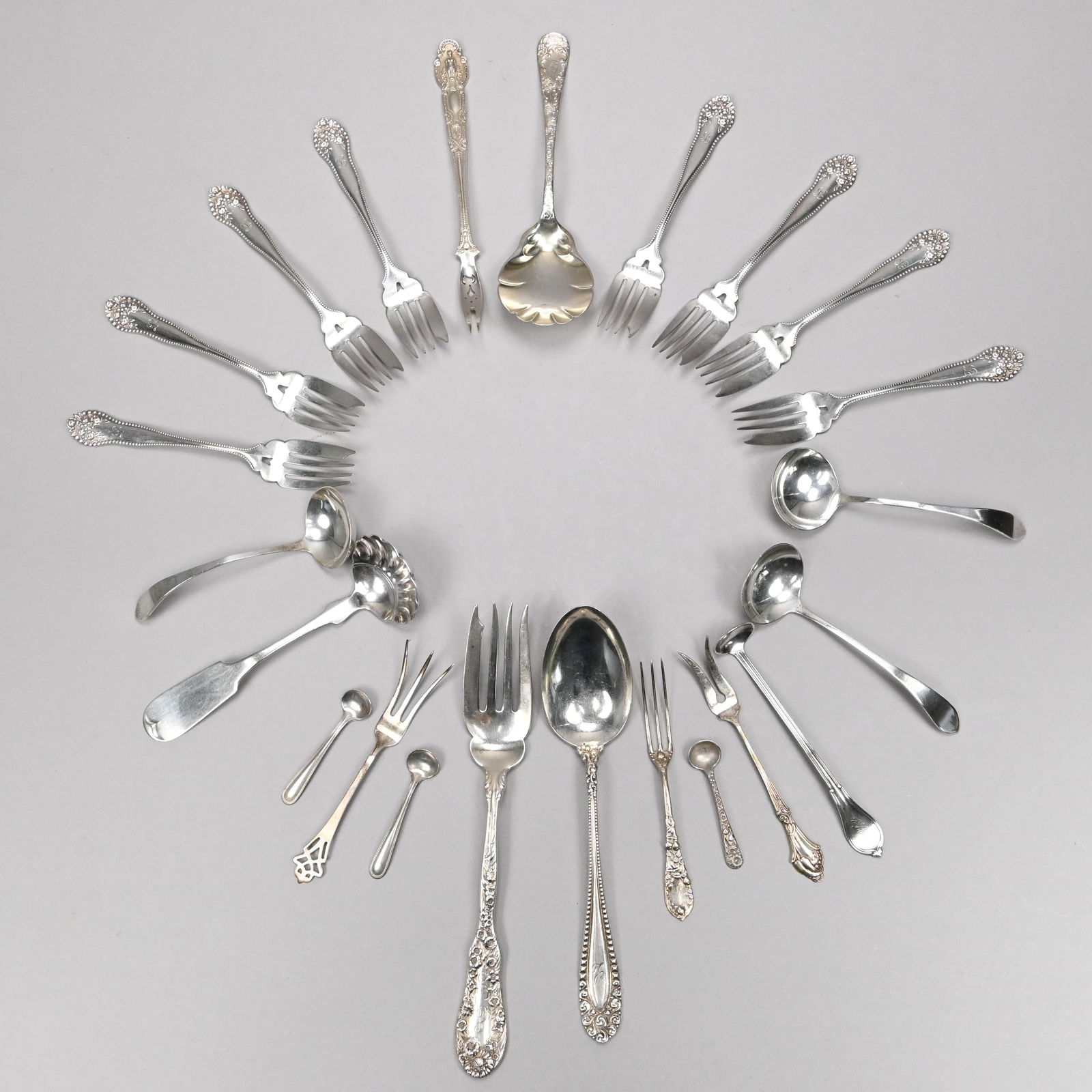 Group of American Sterling Silver Flatware: Group of American Sterling Silver Flatware, Various Makers, Late Nineteenth-Twentieth Century. Including a 'Renaissance' pattern olive fork, Tiffany & Co., Designed by Paulding Farnham in 1904, the Di