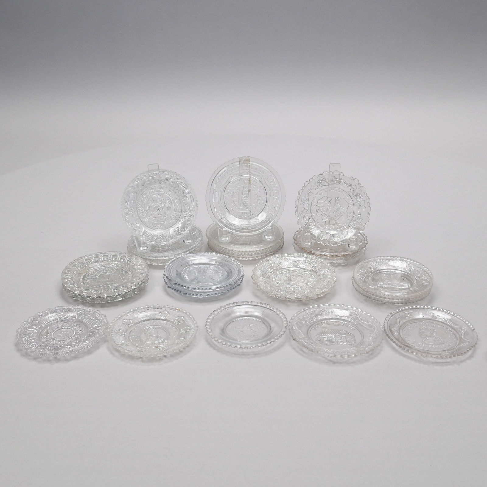 Group of Pressed Colorless Glass Cup Plates (1 of 20)
