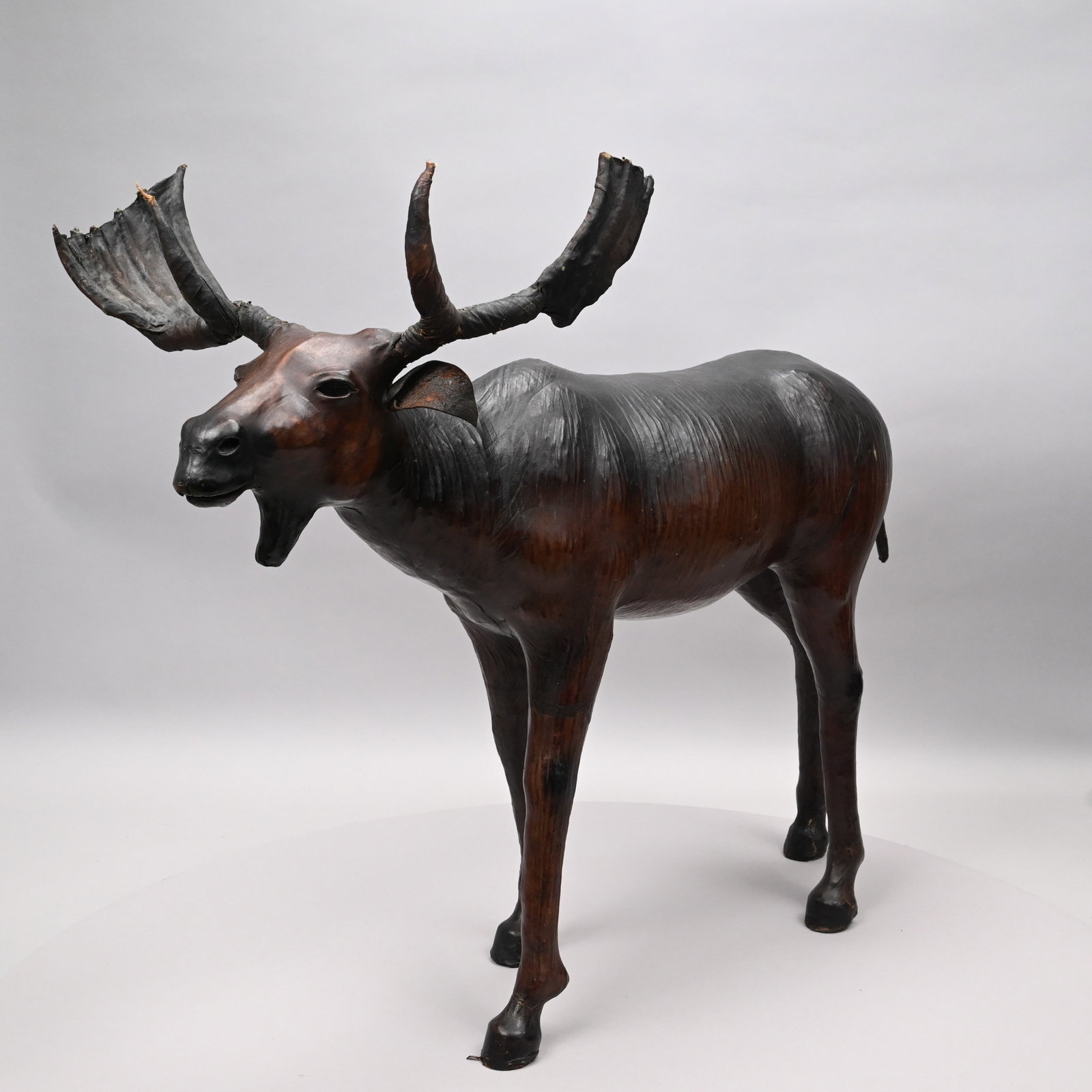 Leather Figure of a Bull Moose: Leather Figure of a Bull Moose. H: 24.5 in., W: 30 in., D: 14.75 in.