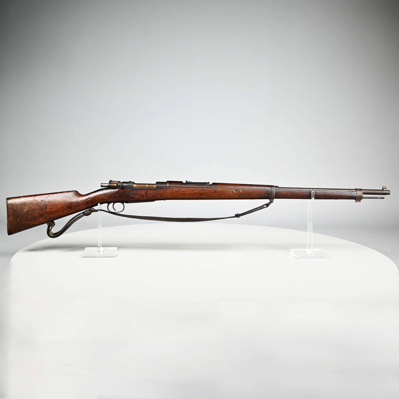 Spanish Mauser Model 1893 7mm Rifle: Spanish Mauser Model 1893, Cal. 7mm., Dated 1896. Serial #A.5402, the 28.5-inch barrel with inverted "V" front sight and ladder rear sight, graduated to 2,000 meters, receiver side marked "MAUSER ESPA