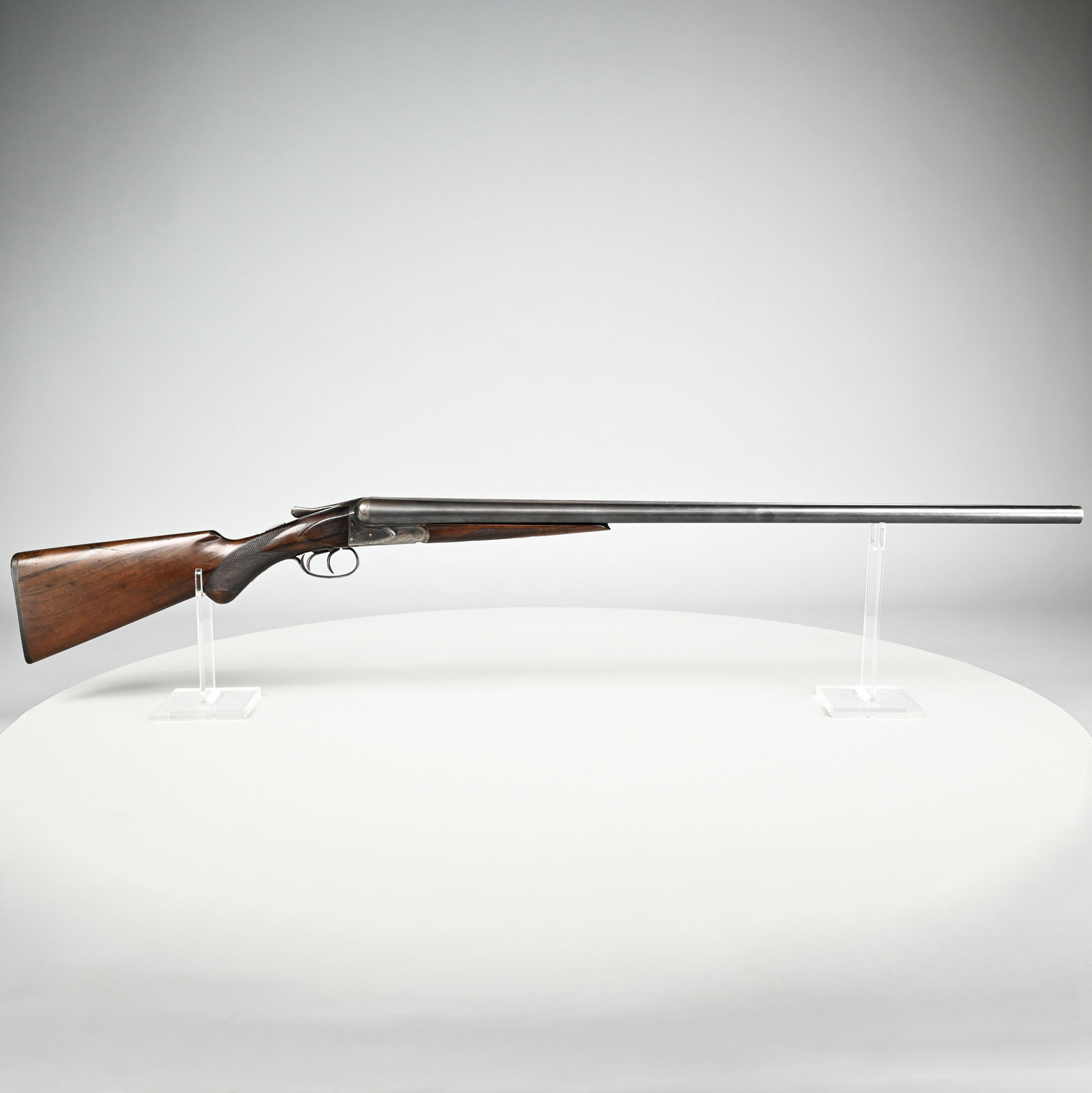 A. H. Fox HE Grade "SuperFox" 12GA Side-By-Side: A. H. Fox HE Grade "SuperFox" 12 Gauge Side-By-Side Hammerless Shotgun, 1926. Serial #31750, the side of the receiver engraved "ANSYLEY H. FOX," the 32-inch barrels stamped "CHROMOX FLUID COMPRESSED S