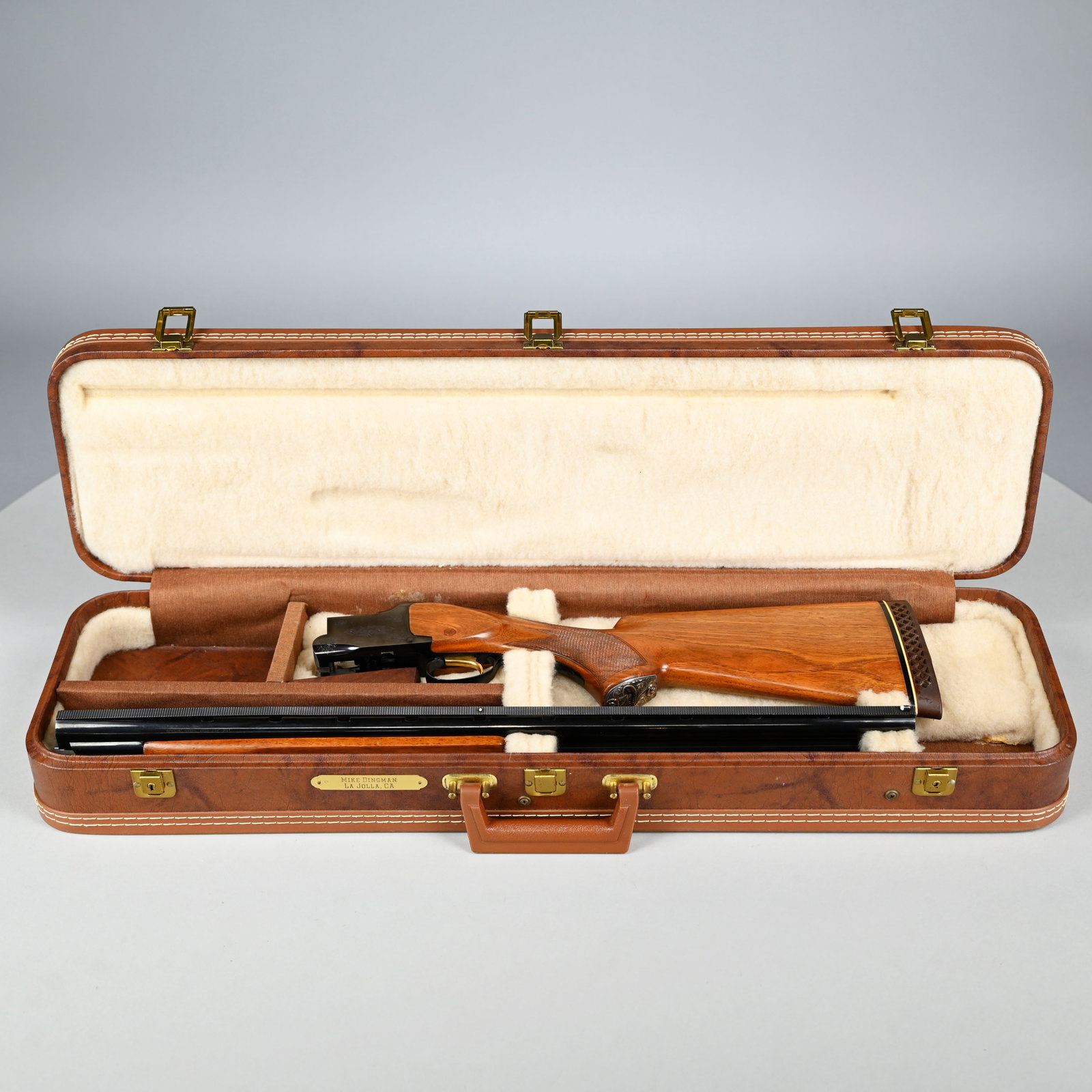 Cased Browning Citori 12 Gauge O/U Shotgun, 1978: Cased Browning Citori 12 Gauge Over/ Under Shotgun,1978. Serial #13277RP1B3, Japanese made, 2 3/4-inch, the receiver engraved with elliptical scrolled vinery and conforming spandrels, flowerhead hinge