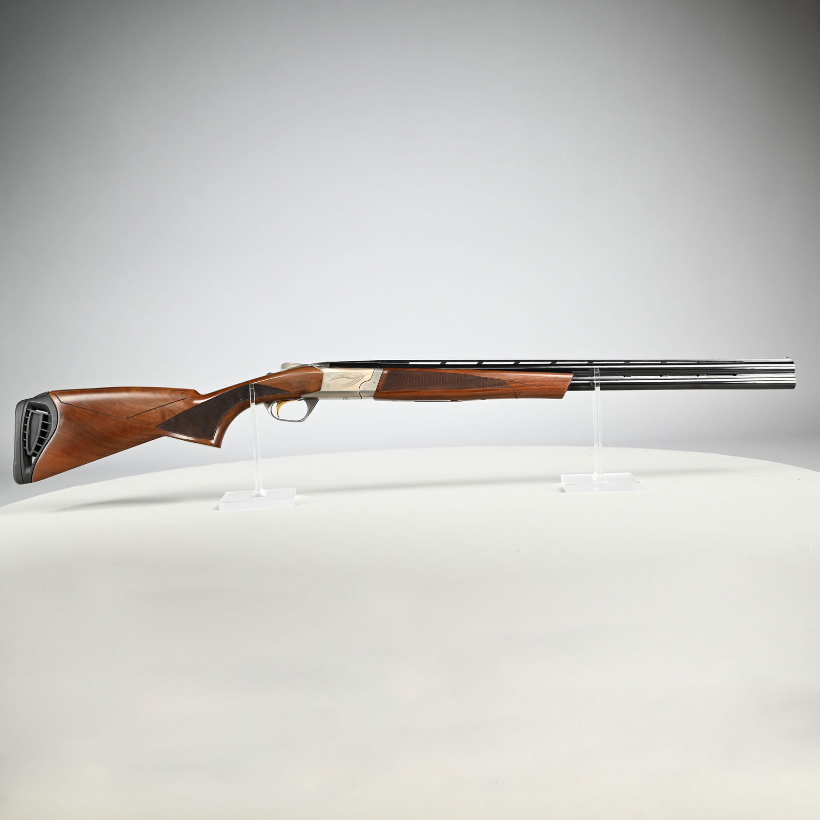 Browning Cynergy Field Over/Under 20GA Shotgun: Browning Cynergy Field Over/Under 20 Gauge Shotgun with Original Box. Serial #05384MV132, 2 3/4- and 3-inch shells, invector plus chokes Modified and Full. The 28-inch barrel with verted rib and side