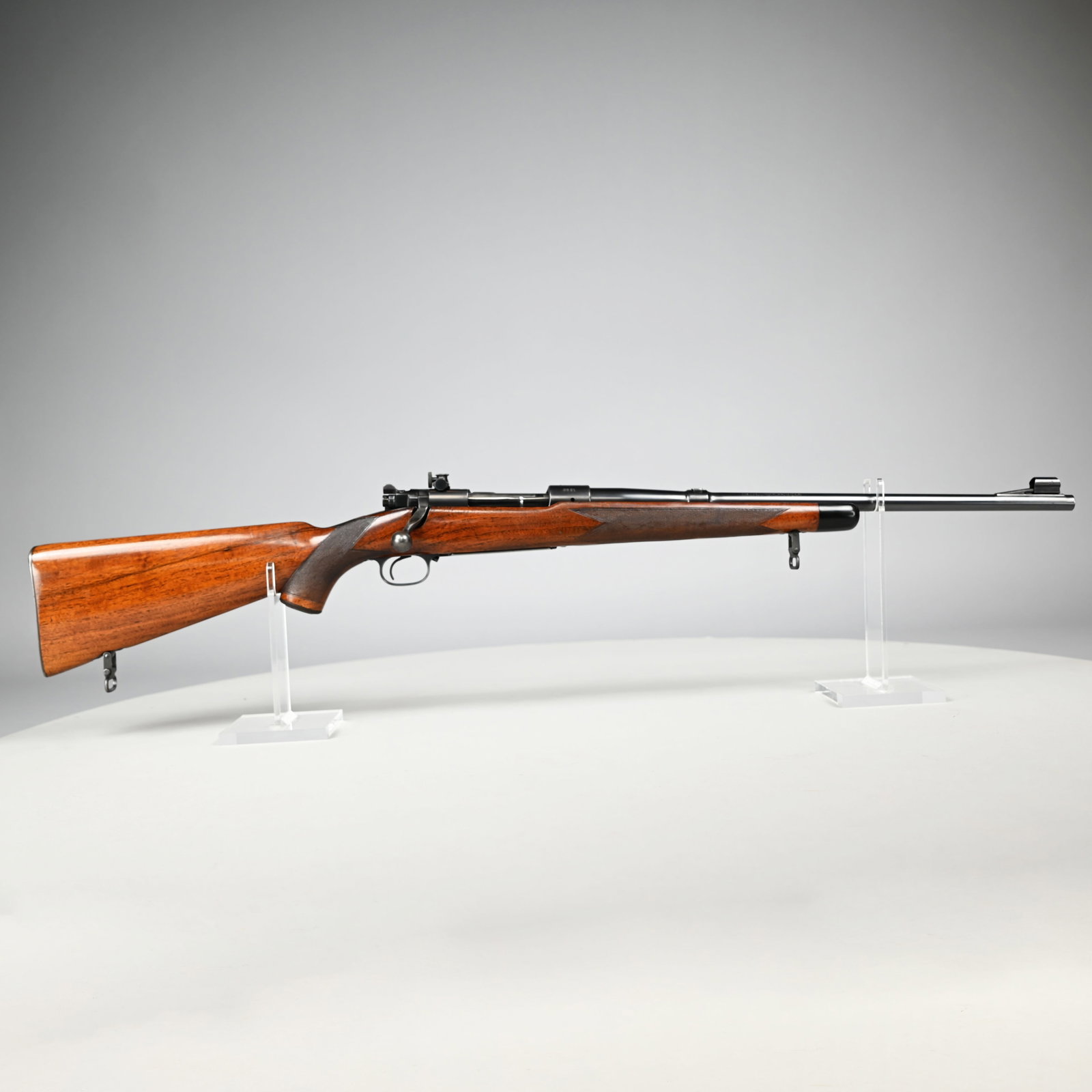 Pre-War Winchester Model 70 Super Grade Carbine: Pre-War Winchester Model 70 Supergrade Bolt-Action Carbine, Cal. .257 Roberts, 1937. Serial #3601, the 20- inch barrel with hooded ramped bead front sight and Lyman adjustable peep rear sight with che
