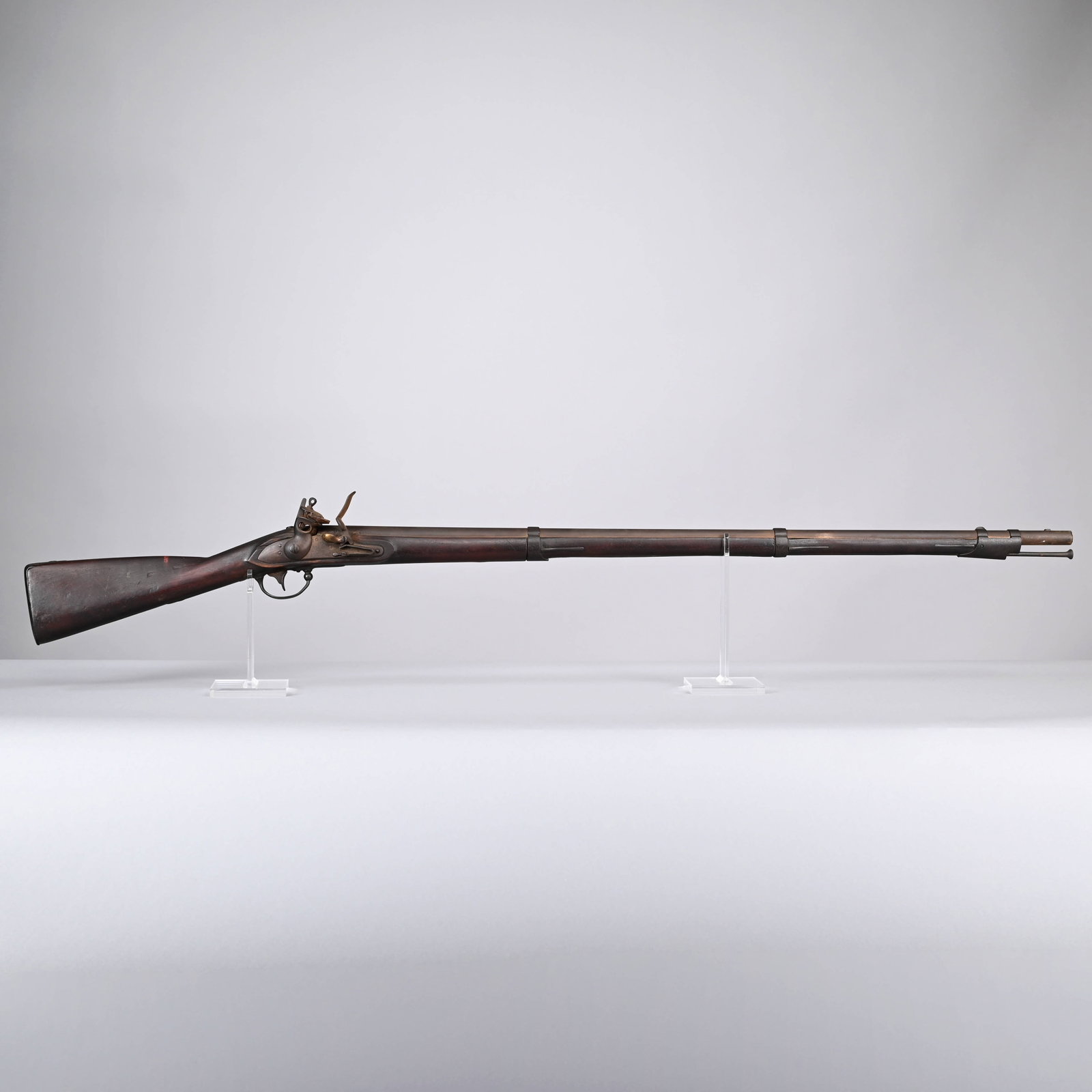 US Model 1816 Flintlock Musket: US Model 1816 Flintlock Musket, .69 Caliber. The lock plate apparently unmarked, the 42-inch barrel marked "US" and dated "1834" with "JM" and "P" proof marks, fastened with iron fittings to the full-
