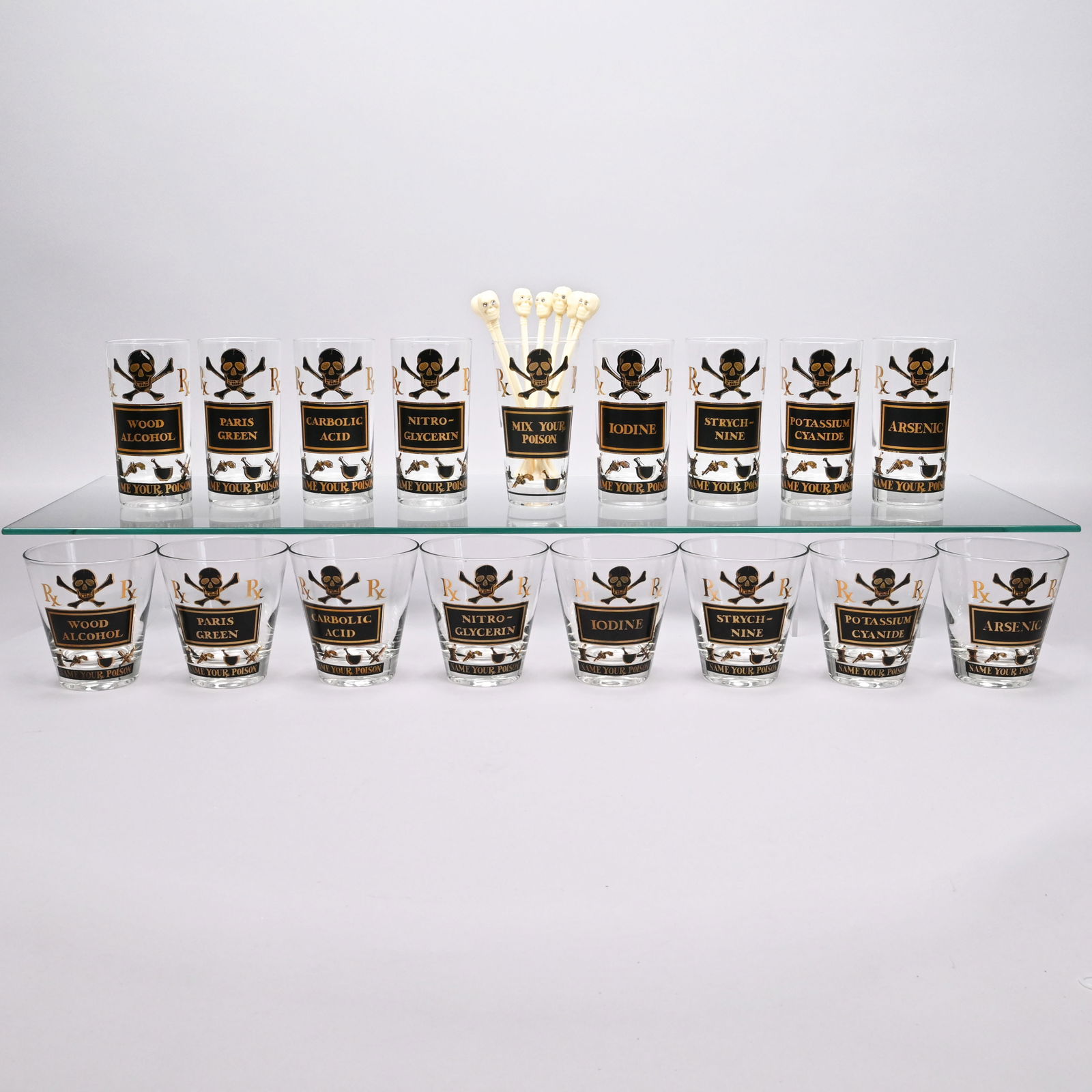 Set Mid-Century Mod. Glass Barware, Georges Briard: Set of Mid-Century Modern 'Name Your Poison' Glass Cocktail Barware, Jascha Brojdo (Georges Briard, Ukraine 1917 - New York, New York 2005), and a Set of Eight 'Skull N' Bones' Stirrers, Probably Made