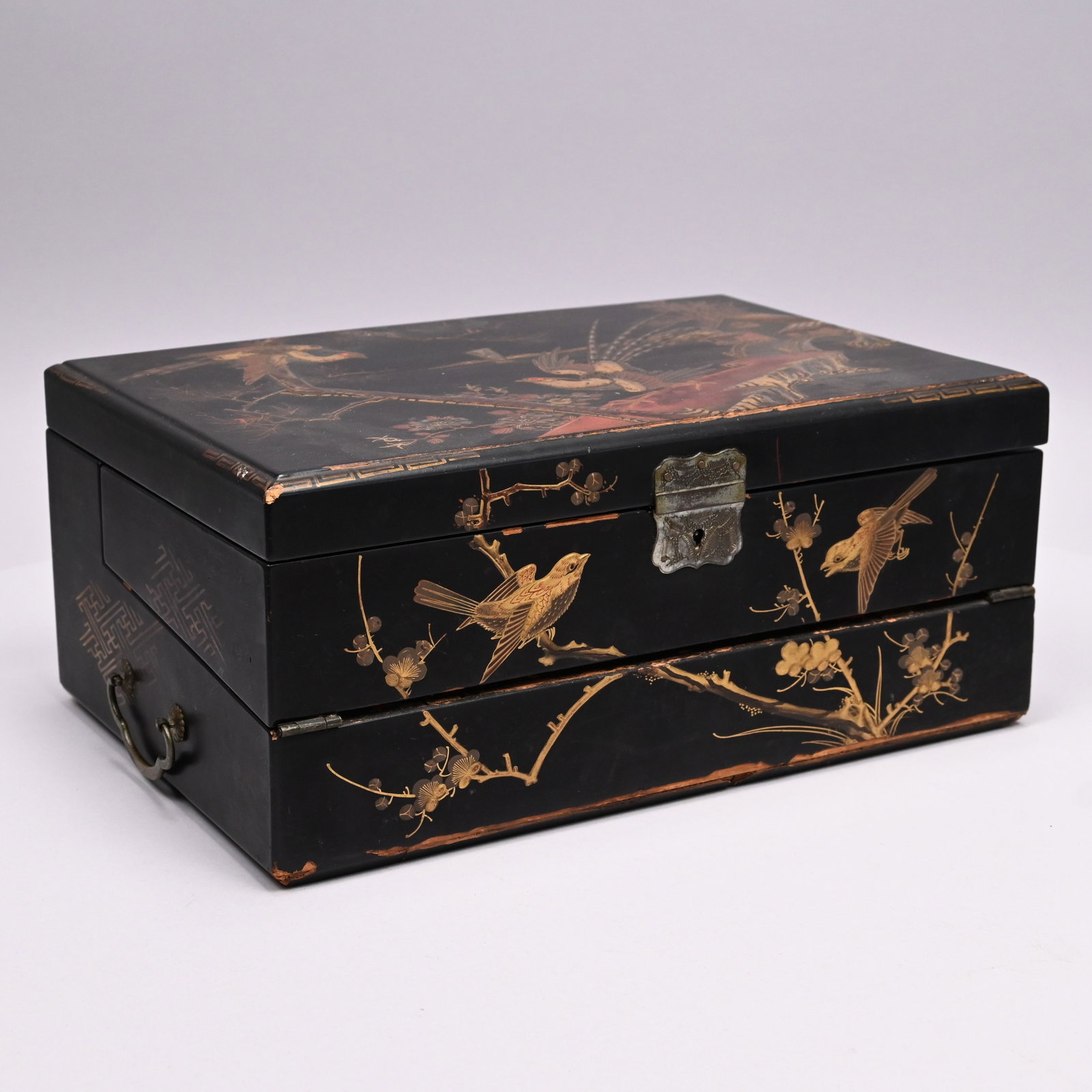 Japanese Lacquered Scholar's Travelling Desk: Japanese Lacquered Scholar's Travelling Desk, Nineteenth Century. The cover decorated in gold and red with a pair of Golden Pheasants on an outcropping leading to an arched bridge and building, the in