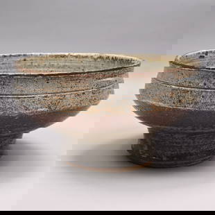 Paul Soldner - Earthenware Footed Bowl: Paul E. Soldner (Summerfield, Illinois, 1921 - Claremont, California, 2011). Glazed Red Earthenware Footed Bowl, Circa 1980. The bowl with two turned lines below the rim, the upper portion covered in