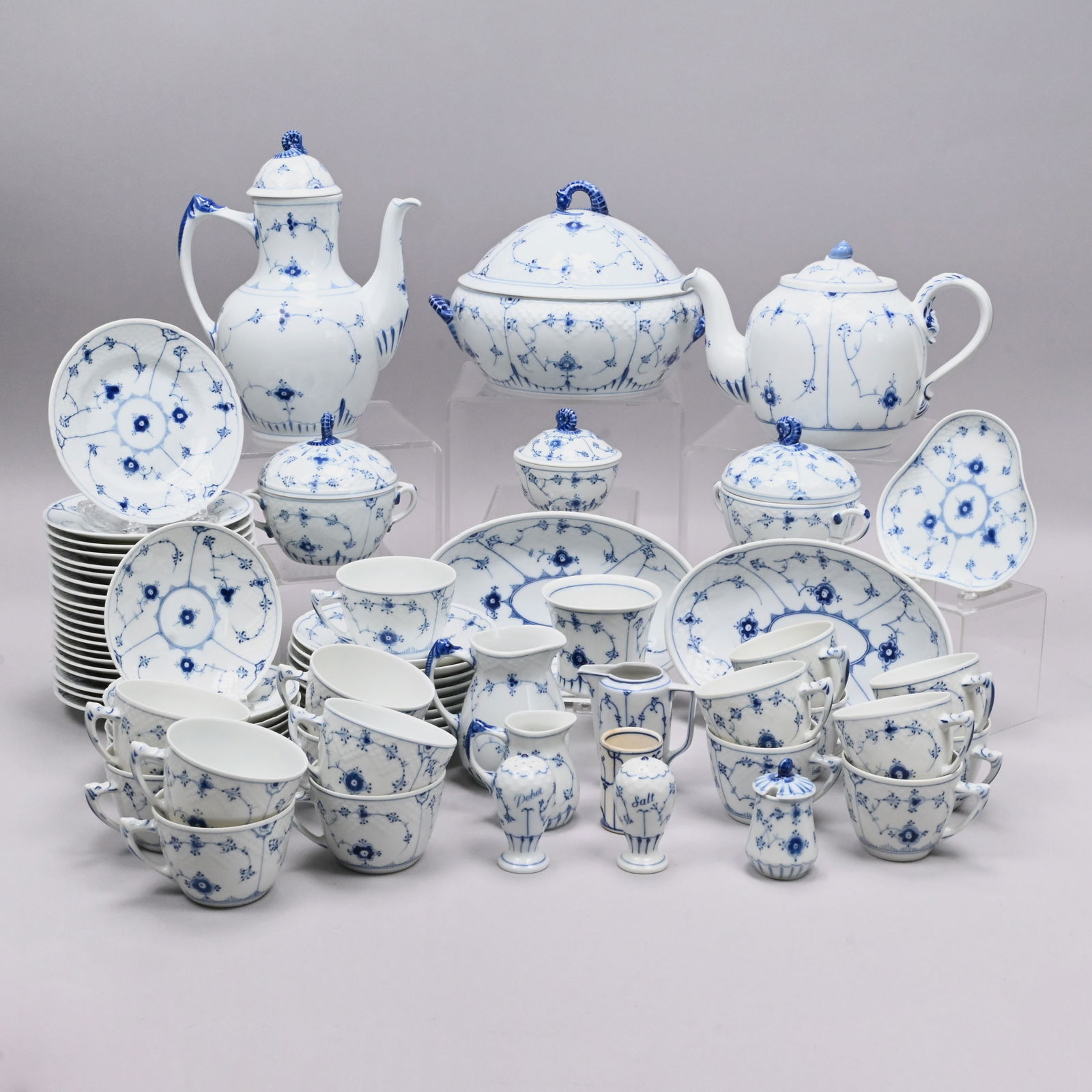 Bing & Grondahl Porcelain Blue Traditional Service: Bing & Grondahl Porcelain 'Blue Traditional' Service, 1960s - 1987. Comprising a #512 dish and cover, pair of #314 oval dishes, twenty 6.125-inch flat plates, #551 mustard pot and cover, pair of salt