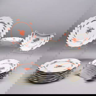 Set of Herend Porcelain 'Chinese Bouquet' Dishes: Set of Hungarian 'Chinese Bouquet - Apponyi Orange' Dishes, Herend Porcelain Manufactory, Twentieth Century. Comprising eight 10.75-inch dinner plates, eight crescent dishes and a bowl, all with print