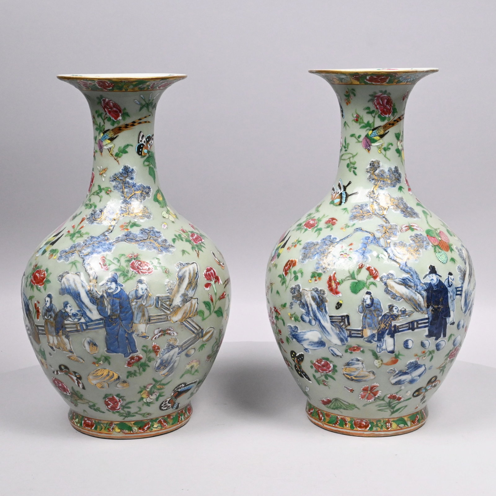 Pair of Chinese Export Porcelain Famille Rose Celadon Vases: Pair of Chinese Export Porcelain 'Clobbered' Famille Rose Celadon Vases, Nineteenth Century. Each of pear shape, painted on one side in gilt-heightened underglaze-blue with a view of scholars in a fen
