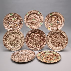 Eight Staffordshire Tortoiseshell-Glazed Plates