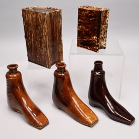 Five Rockingham-Glazed Pottery Flasks