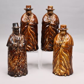 Four Bennington Coachman Bottles