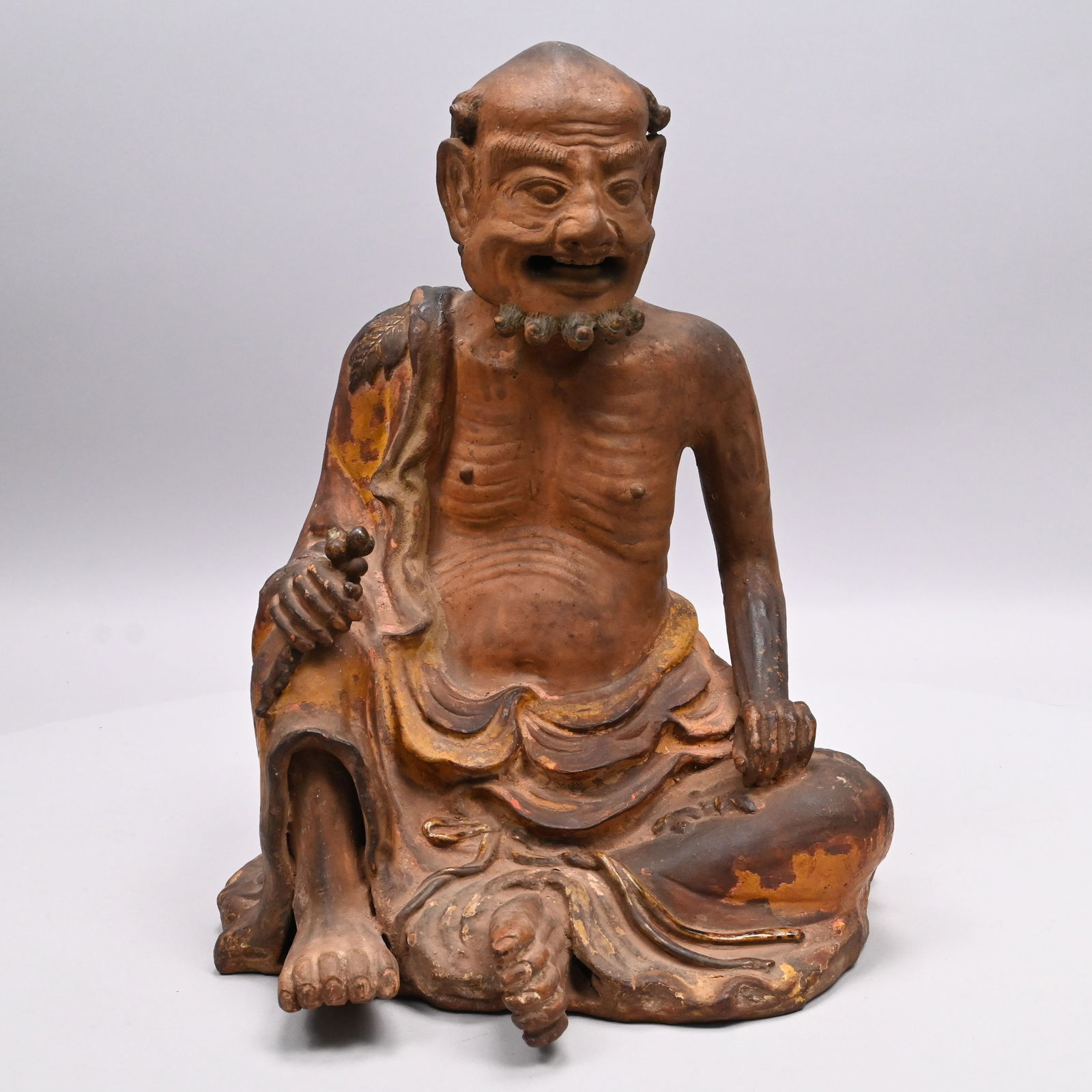 Asian Earthenware Seated Figure (1 of 8)