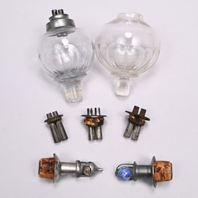 Two Blown Molded Colorless Glass Peg Lamps