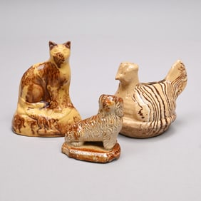 Three American &British Glazed Earthenware Figures
