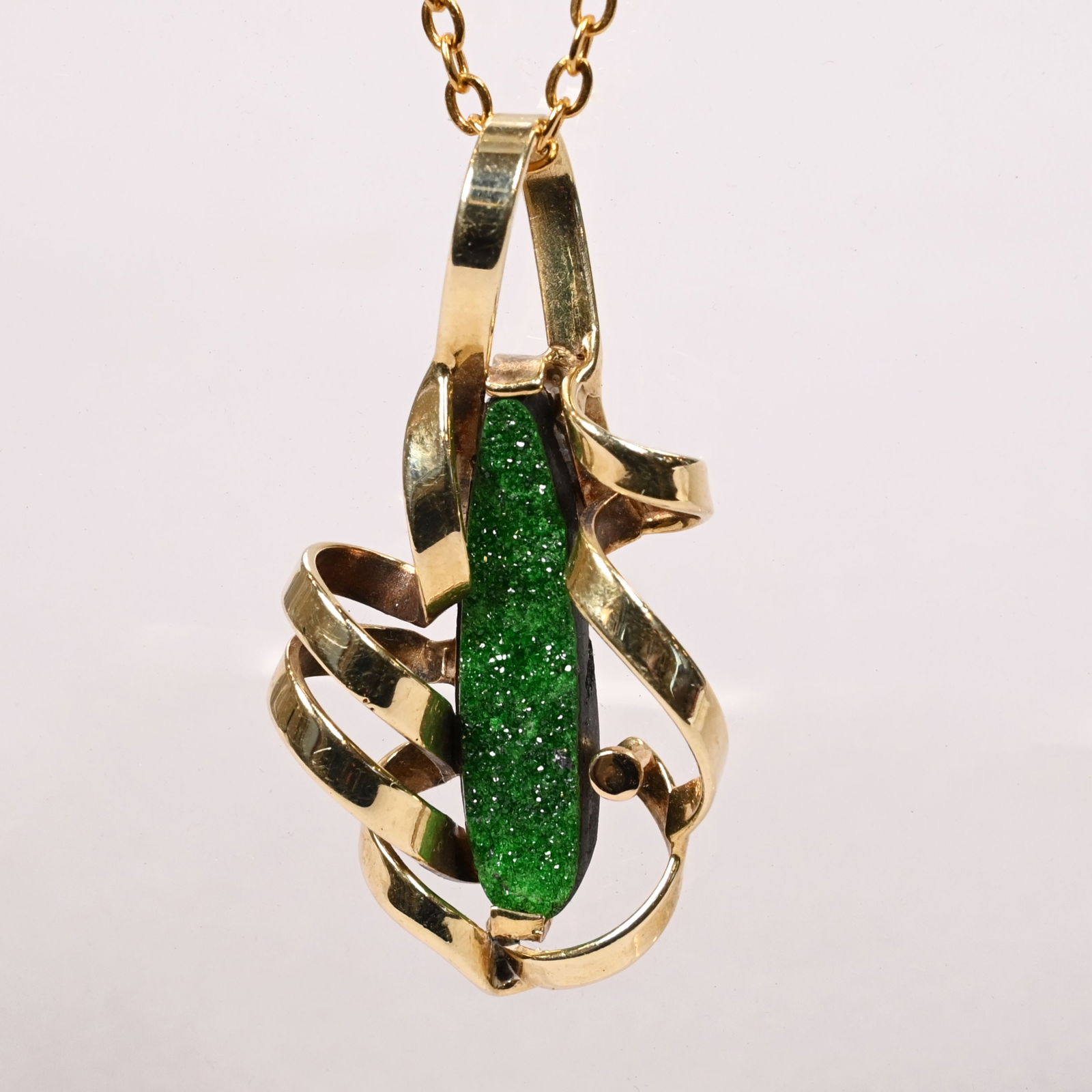 Uvarovite 14k Gold Pendant w/ Gold-Plated Chain: Uvarovite 14k Yellow Gold Pendant with Gold-Plated Chain. The pendant marked "Glen/ HANDMADE" and "14k", the chain clasp marked "K18".Pendant 7.0gL: 25 in.