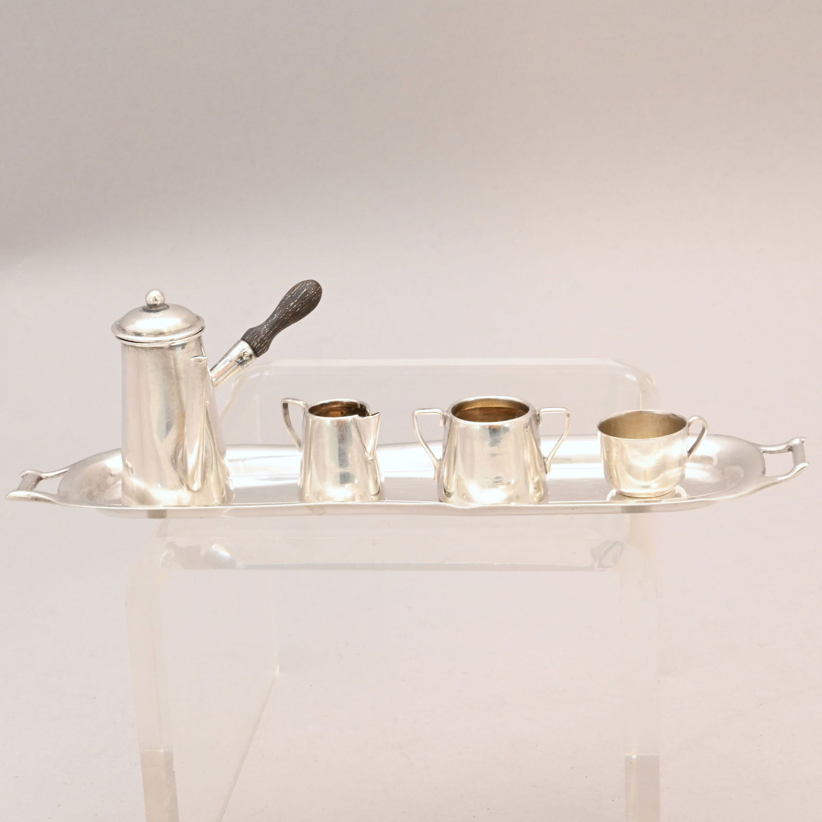 Edward VI Silver Miniature Chocolate Service, 1905: Edward VI Sterling Silver Miniature Chocolate Service, Cornelius Desormeaux Saunders and James Francis Hollings (Frank) Shepherd, Birmingham and Chester, 1905. Comprising a chocolate pot, sugar bowl,