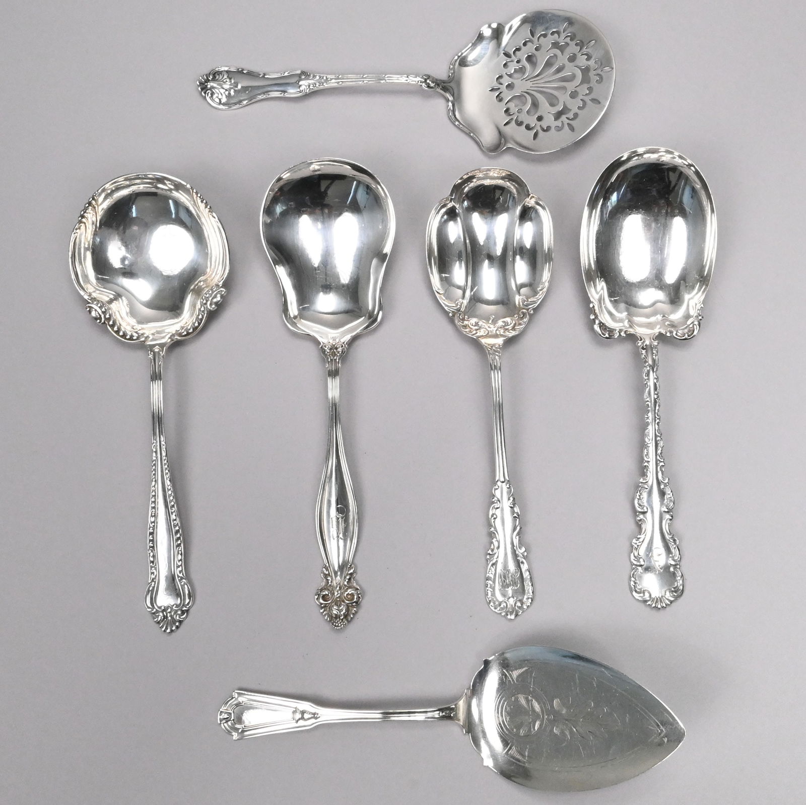 Six American Sterling Silver Serving Pieces: Six American Sterling Silver Serving Pieces, 1888-1915. Comprising a 'Keystone' pie server, not monogrammed, and a 'Louis XV' 9-inch berry spoon, engraved with the initial "A," both Whiting Mfg. Co.,-