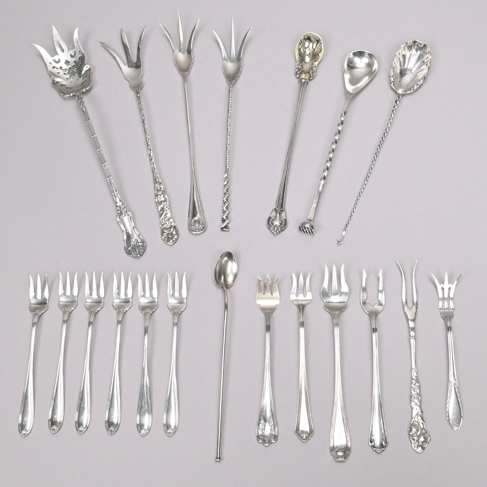 Group of American Sterling Silver Serving Utensils: Group of American Sterling Silver Serving Utensils, Late 19th-20th Century. Comprising a set of six 'Margaret, Old' cocktail forks, Simpson, Hall, Miller & Co.-International Silver Co., Meriden, Conne